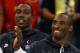 BEIJING - AUGUST 24: (L-R) Dwight Howard #11 and Kobe Bryant #10 of the United States wait to receive the gold medal after defeating Spain in the men's basketball final during Day 16 of the Beijing 2008 Olympic Games at the Beijing Olympic Basketball Gymnasium on August 24, 2008 in Beijing, China. (Photo by Jed Jacobsohn/Getty Images)