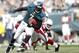 PHILADELPHIA, PA - NOVEMBER 13: Michael Vick #7 of the Philadelphia Eagles looks for room to run as Richard Marshall #31of the Arizona Cardinals closes in during a game at Lincoln Financial Field on November 13, 2011 in Philadelphia, Pennsylvania. The Cardinals defeated the Eagles 21-17. (Photo by Rich Schultz /Getty Images)