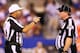 EAST RUTHERFORD, NJ - SEPTEMBER 05: Referee Jim Core (L) talks with umpire Bob Shoulders during the 2012 NFL season opener between the New York Giants and the Dallas Cowboys at MetLife Stadium on September 5, 2012 in East Rutherford, New Jersey. (Photo by Al Bello/Getty Images)
