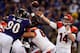 BALTIMORE, MD - SEPTEMBER 10: Quarterback Andy Dalton #14 of the Cincinnati Bengals passes the ball in the first half against the defensive end Pernell McPhee #90 of the Baltimore Ravens at M&T Bank Stadium on September 10, 2012 in Baltimore, Maryland. (Photo by Rob Carr/Getty Images)