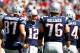 FOXBORO, PA - SEPTEMBER 16: Tom Brady #12 of the New England Patriots stands in the huddle with his team against the Arizona Cardinals during the game on September 16, 2012 at Gillette Stadium in Foxboro, Massachusetts. (Photo by Jared Wickerham/Getty Images)