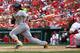 ST. LOUIS, MO - AUGUST 19: Andrew McCutchen #22 of the Pittsburgh Pirates hits an RBI single against the St. Louis Cardinals at Busch Stadium on August 19, 2012 in St. Louis, Missouri. (Photo by Dilip Vishwanat/Getty Images)