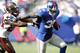 EAST RUTHERFORD, NJ - SEPTEMBER 16: Andre Brown #35 of the New York Giants holds off Mark Barron #24 of the Tampa Bay Buccaneers during a game at MetLife Stadium on September 16, 2012 in East Rutherford, New Jersey. (Photo by Jeff Zelevansky/Getty Images)