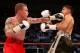 NOTTINGHAM, ENGLAND - MAY 26: Carl Frampton (L) in action with Raul Hirales during their Vacant IBF Inter-Continental Super Bantam Weight Championship bout at Nottingham Capital FM Arena on May 26, 2012 in Nottingham, England. (Photo by Scott Heavey/Getty Images)