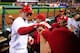 ST. LOUIS, MO - SEPTEMBER 19: David Freese #23 of the St. Louis Cardinals is congratulated by batting coach Mark McGwire #25 after hitting a two run home run against the Houston Astros at Busch Stadium on September 19, 2012 in St. Louis, Missouri. (Photo by Jeff Curry/Getty Images)