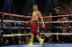 LAS VEGAS, NV - SEPTEMBER 15: Julio Cesar Chavez Jr. (L) is instructed to walk away by referee Tony Weeks after knocking down Sergio Martinez in the twelfth round of their WBC middleweight title fight at the Thomas & Mack Center on September 15, 2012 in Las Vegas, Nevada. (Photo by Jeff Bottari/Getty Images)