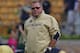 SOUTH BEND, IN - SEPTEMBER 08: Head coach Brian Kelly of the Notre Dame Fighting Irish watches warm-ups before his team takes on the Purdue Boilermakers at Notre Dame Stadium on September 8, 2012 in South Bend, Indiana. Notre Dame defeated Purdue 21-17. (Photo by Jonathan Daniel/Getty Images)