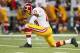ST. LOUIS, MO - SEPTEMBER 16: Robert Griffin III #10 of the Washington Redskins 'Tebows' after throwing a touchdown pass against the St. Louis Rams at the Edward Jones Dome on September 16, 2012 in St. Louis, Missouri. (Photo by Dilip Vishwanat/Getty Images)