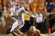 KNOXVILLE, TN - SEPTEMBER 15: Jeff Driskel #6 quarterback of the Florida Gators breaks free from A.J. Johnson #45 of the Tennessee Volunteers during the second half of play at Neyland Stadium on September 15, 2012 in Knoxville, Tennessee. (Photo by John Sommers II/Getty Images)