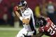 Sep 17, 2012; Atlanta, GA, USA; Denver Broncos quarterback Peyton Manning (18) is pressured by Atlanta Falcons safety William Moore (25) at the Georgia Dome. The Falcons defeated the Broncos 27-21. Mandatory Credit: Kirby Lee/Image of Sport-US PRESSWIRE