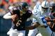 Sep 9, 2012; Chicago, IL, USA; Chicago Bears quarterback Jay Cutler (6) runs out of the grasp of Indianapolis Colts linebacker Jerrell Freeman (50) during the first quarter at Soldier Field. Mandatory Credit: Dennis Wierzbicki-US PRESSWIRE