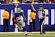 August 29, 2012; East Rutherford, NJ, USA; New York Giants Rueben Randle (82) runs with the ball as replacement back judge Jeff Corley (21) throws a flag during the third quarter of a preseason game against the New England Patriots at MetLife Stadium. Mandatory Credit: Brad Penner-US PRESSWIRE