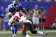 EAST RUTHERFORD, NJ - SEPTEMBER 16: Mark Barron #24 of the Tampa Bay Buccaneers tackles Hakeem Nicks #88 of the New York Giants during a game at MetLife Stadium on September 16, 2012 in East Rutherford, New Jersey. (Photo by Jeff Zelevansky/Getty Images)