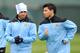 MANCHESTER, ENGLAND - MARCH 14: Carlos Tevez (L) and Sergio Aguero of Manchester City attend a training session ahead of their UEFA Europa League Round 16 second Leg match against Sporting Lisbon at the Carrington Training Ground on March 14, 2012 in Manchester, England. (Photo by Clint Hughes/Getty Images)