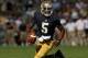 SOUTH BEND, IN - SEPTEMBER 08: Everett Golson #5 of the Notre Dame Fighting Irish rolls out to look for a receiver against the Purdue Boilermakers at Notre Dame Stadium on September 8, 2012 in South Bend, Indiana. Notre Dame defeated Purdue 21-17. (Photo by Jonathan Daniel/Getty Images)