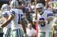 SEATTLE, WA - SEPTEMBER 16: Quarterback Tony Romo #9 of the Dallas Cowboys shouts instructions to Miles Austin #19 during a game against the Seattle Seahawks at CenturyLink Field on September 16, 2012 in Seattle, Washington. Seattle won the game 27-7. (Photo by Stephen Brashear/Getty Images)