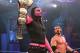 Austin Aries watches Jeff Hardy with the TNA World Heavyweight title. (Photo credit: Lee South, TNA Wrestling)
