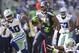 SEATTLE, WA - SEPTEMBER 16: Marshawn Lynch #24, center, of the Seattle Seahawks rushes the ball as Danny McCray #40, left, of the Dallas Cowboys and teammate Morris Claiborne #24 chase during play at CenturyLink Field on September 16, 2012 in Seattle, Washington. (Photo by Stephen Brashear/Getty Images)