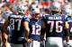 FOXBORO, PA - SEPTEMBER 16: Tom Brady #12 of the New England Patriots stands in the huddle with his team against the Arizona Cardinals during the game on September 16, 2012 at Gillette Stadium in Foxboro, Massachusetts. (Photo by Jared Wickerham/Getty Images)