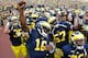 ANN ARBOR, MI - SEPTEMBER 08: Denard Robinson #16 of the Michigan Wolverines celebrates a 31-25 win over the Air Force Falcons with his teammates at Michigan Stadium on September 8, 2012 in Ann Arbor, Michigan. (Photo by Gregory Shamus/Getty Images)