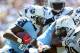 SAN DIEGO, CA - SEPTEMBER 16: Chris Johnson #28 of the Tennessee Titans carries the ball in front of Aubrayo Franklin #90 of the San Diego Chargers at Qualcomm Stadium on September 16, 2012 in San Diego, California. (Photo by Harry How/Getty Images)