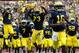ANN ARBOR, MI - SEPTEMBER 08: Denard Robinson #16 and Roy Roundtree #21 of the Michigan Wolverines lead the team onto the field prior to playing the Air Force Falcons at Michigan Stadium on September 8, 2012 in Ann Arbor, Michigan. (Photo by Gregory Shamus/Getty Images)