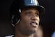 NEW YORK, NY - SEPTEMBER 15: Robinson Cano #24 of the New York Yankees looks on from the dugout after he scored a run against the Tampa Bay Rays on September 15, 2012 at Yankee Stadium in the Bronx borough of New York City. (Photo by Elsa/Getty Images)