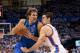 OKLAHOMA CITY, OK - APRIL 30: Dirk Nowitzki #41 of the Dallas Mavericks drives on Nick Collison #4 of the Oklahoma City Thunder in Game Two of the Western Conference Quarterfinals in the 2012 NBA Playoffs on April 30, 2012 at the Chesapeake Energy Arena in Oklahoma City, Oklahoma. Oklahoma City defeated Dallas 102-99. NOTE TO USER: User expressly acknowledges and agrees that, by downloading and or using the photograph, User is consenting to the terms and conditions of the Getty Images License Agreement. (Photo by Brett Deering/Getty Images)