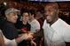 May 5, 2012; East Rutherford, NJ, USA; Jon Jones (far right) shakes hands with fans during the middleweight bout between Alan Belcher and Rousimar Palhares during UFC on Fox 3 at the Izod Center. Mandatory Credit: Joe Camporeale-US PRESSWIRE
