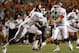 September 1, 2012; Dallas, TX, USA; Oklahoma Sooners quarterback Landry Jones (12) hands off to running back Dominique Whaley (8) in the second quarter against the UTEP Miners at Sun Bowl Stadium. Mandatory Credit: Jim Cowsert-US PRESSWIRE