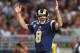 ST. LOUIS, MO - SEPTEMBER 16: Sam Bradford #8 of the St. Louis Rams looks, unsuccessfully, for a touchdown call against the Washington Redskins at the Edward Jones Dome on September 16, 2012 in St. Louis, Missouri. (Photo by Dilip Vishwanat/Getty Images)