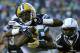 SAN DIEGO, CA - NOVEMBER 06: Greg Jennings #85 of the Green Bay Packers fights fights for yards on Antoine Cason #20 and Dante Hughes #33 of the San Diego Chargers at Qualcomm Stadium on November 6, 2011 in San Diego, California. (Photo by Harry How/Getty Images)