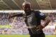 READING, ENGLAND - SEPTEMBER 16: Jermain Defoe of Tottenham Hotspur celebrates his second goal during the Barclays Premier League match between Reading and Tottenham Hotspur at Madejski Stadium on September 16, 2012 in Reading, England. (Photo by Mike Hewitt/Getty Images)