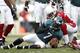 PHILADELPHIA, PA - NOVEMBER 13: Michael Vick #7 of the Philadelphia Eagles is tackled by Richard Marshall #31 of the Arizona Cardinals during a game at Lincoln Financial Field on November 13, 2011 in Philadelphia, Pennsylvania. The Cardinals defeated the Eagles 21-17. (Photo by Rich Schultz /Getty Images)