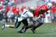 COLUMBUS, OH - SEPTEMBER 22: Jake Ganus #4 of the University of Alabama at Birmingham Blazers tackles Corey Brown #10 of the Ohio State Buckeyes during the second quarter on September 22, 2012 at Ohio Stadium in Columbus, Ohio. (Photo by Kirk Irwin/Getty Images)