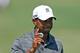 ATLANTA, GA - SEPTEMBER 22: Tiger Woods waves to the gallery after a birdie on the fourth hole during the third round of the TOUR Championship by Coca-Cola at East Lake Golf Club on September 22, 2012 in Atlanta, Georgia. (Photo by Scott Halleran/Getty Images)