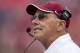 FAYETTEVILLE, AR - SEPTEMBER 15: Head Coach John L. Smith of the Arkansas Razorbacks watches on the sidelines during a game against the Alabama Crimson Tide at Razorback Stadium on September 15, 2012 in Fayetteville, Arkansas. The Crimson Tide defeated the Razorbacks 52-0. (Photo by Wesley Hitt/Getty Images)