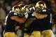 SOUTH BEND, IN - SEPTEMBER 22: Linebacker Manti Te'o #5 of the Notre Dame Fighting Irish celebrates with teammates in the second quarter against the Michigan Wolverines at Notre Dame Stadium on September 22, 2012 in South Bend, Indiana. (Photo by Jonathan Daniel/Getty Images)