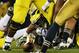 SOUTH BEND, IN - SEPTEMBER 22: Quarterback Denard Robinson #16 of the Michigan Wolverines fumbles the ball in the third quarter against the Notre Dame Fighting Irish at Notre Dame Stadium on September 22, 2012 in South Bend, Indiana. (Photo by Jonathan Daniel/Getty Images)