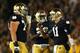 SOUTH BEND, IN - SEPTEMBER 22: Quarterback Tommy Rees #11 of the Notre Dame Fighting Irish celebrates with teammates guard Christian Lombard #74 against the Notre Dame Fighting Irish running back Cierre Wood #20 in the fourth quarter against the Michigan Wolverines at Notre Dame Stadium on September 22, 2012 in South Bend, Indiana. (Photo by Jonathan Daniel/Getty Images)