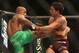 September 22, 2012; Toronto, ON, CANADA; Demetrious Johnson (left) kicks Joseph Benavidez during the flyweight championship at UFC 152 at the Air Canada Centre. Mandatory Credit: Tom Szczerbowski-US PRESSWIRE