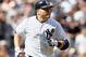 NEW YORK, NY - SEPTEMBER 16: Russell Martin #55 of the New York Yankees looks on after hitting a three run home run against the Tampa Bay Rays at Yankee Stadium on September 16, 2012 in the Bronx borough of New York City. (Photo by Alex Trautwig/Getty Images)