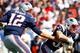 FOXBORO, PA - SEPTEMBER 16: Tom Brady #12 of the New England Patriots hands the ball off to teammate Danny Woodhead #39 against Arizona Cardinals during the game on September 16, 2012 at Gillette Stadium in Foxboro, Massachusetts. (Photo by Jared Wickerham/Getty Images)