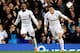 LONDON, ENGLAND - SEPTEMBER 23: Jermain Defoe of Spurs celebrates with teammate Gareth Bale (R) after scoring his team's second goal during the Barclays Premier League match between Tottenham Hotspur and Queens Park Rangers at White Hart Lane on September 23, 2012 in London, England. (Photo by Mike Hewitt/Getty Images)