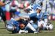 NASHVILLE, TN - SEPTEMBER 23: Akeem Ayers #56 of the Tennessee Titans sacks Matthew Stafford #9 of the Detroit Lions during the game at LP Field on September 23, 2012 in Nashville, Tennessee. The Titans won 44-41 in overtime. (Photo by Joe Robbins/Getty Images)