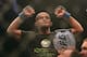 September 22, 2012; Toronto, ON, CANADA; Demetrious Johnson celebrates his win over Joseph Benavidez (not pictured) in the flyweight championship during UFC 152 at the Air Canada Centre. Mandatory Credit: Tom Szczerbowski-US PRESSWIRE