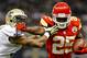 September 23, 2012; New Orleans, LA, USA; Kansas City Chiefs running back Jamaal Charles (25) stiff arms New Orleans Saints linebacker Jonathan Casillas (52) on a run during the first quarter of a game at the Mercedes-Benz Superdome. Mandatory Credit: Derick E. Hingle-US PRESSWIRE