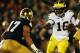 SOUTH BEND, IN - SEPTEMBER 22: Quarterback Denard Robinson #16 of the Michigan Wolverines runs the ball against safety Zeke Motta #17 of the Notre Dame Fighting Irish in the first quarter at Notre Dame Stadium on September 22, 2012 in South Bend, Indiana. (Photo by Jonathan Daniel/Getty Images)