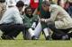 Sept 23, 2012; Miami Gardens, FL, USA; New York Jets cornerback Darrelle Revis (24) is attended to after being injured in the second half in a game against the Miami Dolphins at Sun Life Stadium. Mandatory Credit: Robert Mayer-US PRESSWIRE