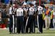ST LOUIS, MO - SEPTEMBER 16: Replacement referees huddle during a timeout in the game between the Washington Redskins and the St. Louis Rams at Edward Jones Dome on September 16, 2012 in St Louis, Missouri. (Photo by Jamie Squire/Getty Images)